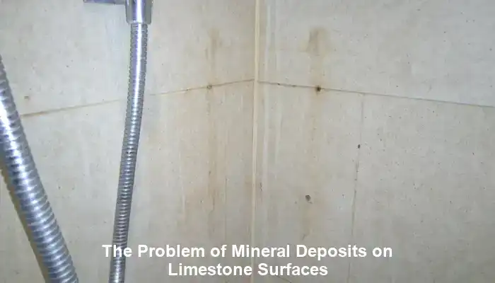 Hard water mineral deposits on limestone floors