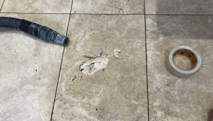 Large travertine cavity beside cracks and unstable edges