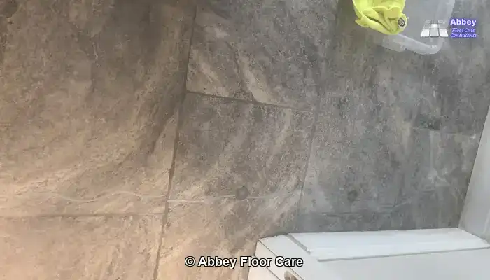 Tumbled travertine floor in Hemel Hempstead being sealed to enrich colour and protect the surface