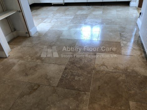 Protective sealer applied to a restored travertine floor in New Malden