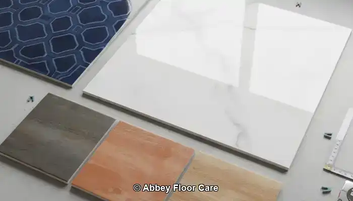 Porcelain tile floor showing dull traffic lanes and uneven reflective patches after cleaning