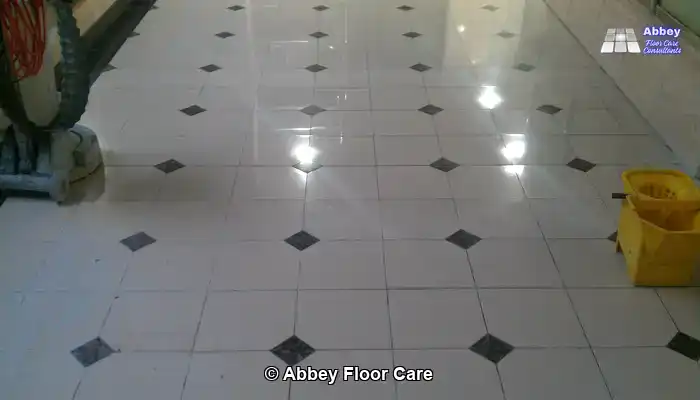 Marble floor after honing and final finishing, showing restored clarity and natural veining.