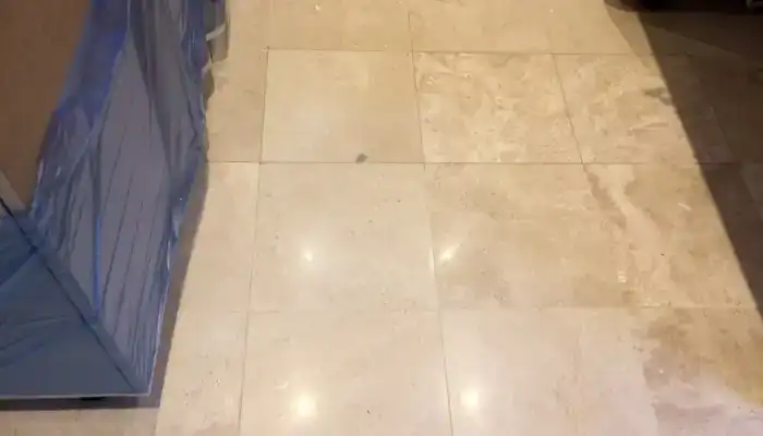 Natural fossil markings and surface texture in limestone flooring