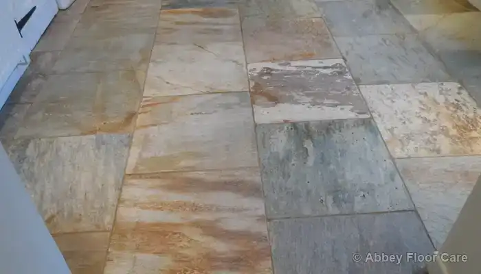 Sandstone floor after professional cleaning showing a natural, even finish
