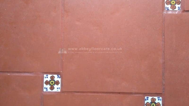 Spanish-style terracotta floor before cleaning and sealing in Brighton, Sussex